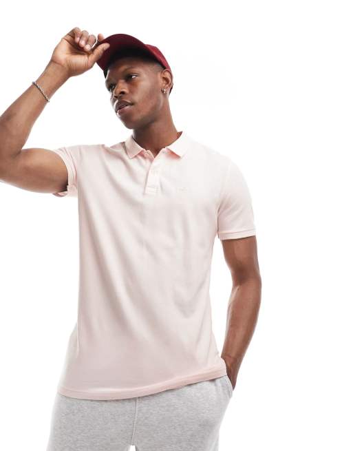 Hollister – Pikee-Polohemd in Hellrosa mit Markenlogo