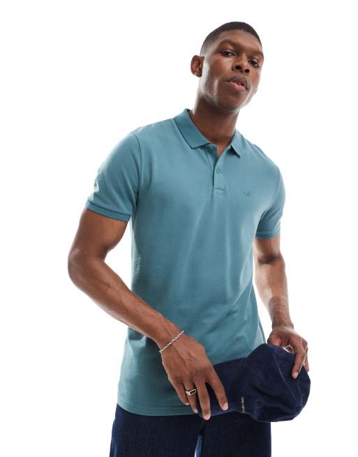 Hollister – Pikee-Polohemd in Mittelblau mit Zierstreifen und Markenlogo