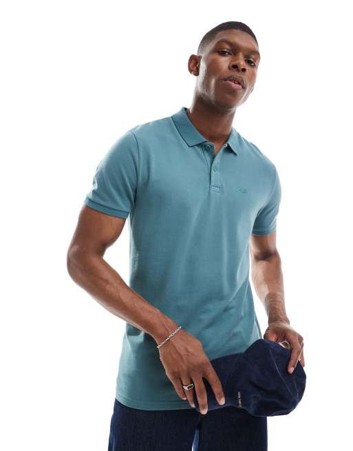 Hollister - Piqué polo met icoonlogo en een gekleurd randje in middenblauw