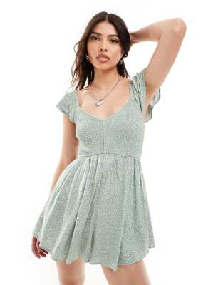 Hollister - Playsuit mit kurzen Flatterärmeln und grünem Blumenmuster