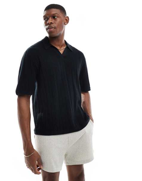 Hollister - Polo in maglia nera a maniche corte con righe a contrasto - view 1