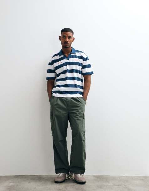 Hollister - Polo oversize a maniche corte blu navy e bianca a righe - view 1