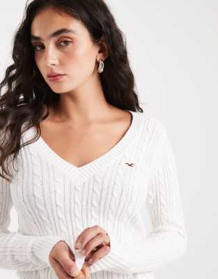 Hollister - Pullover in Weiß mit V-Ausschnitt und Grafikprint auf der Brust
