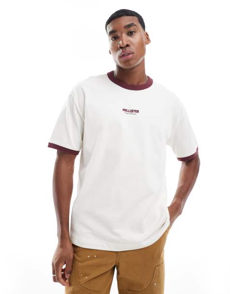 Hollister - Recht hoogsluitend T-shirt met logo en contrasterende biezen in beige - view 1