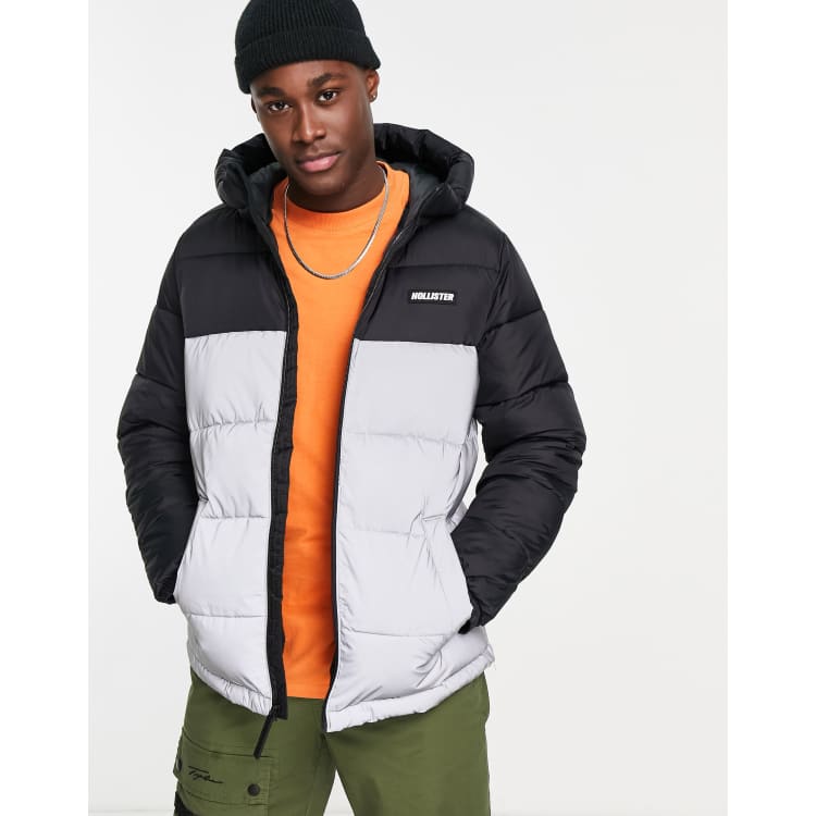 Hollister reflective logo color block hooded puffer jacket in black