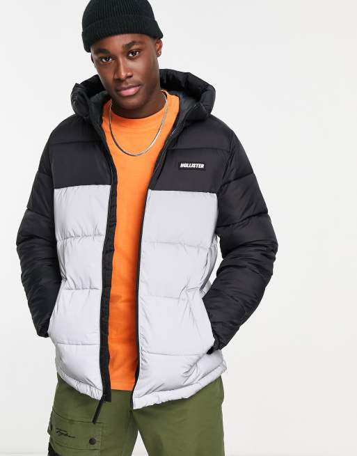 Hollister reflective logo colourblock hooded puffer jacket in black | ASOS