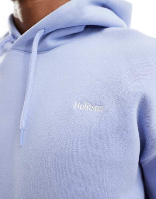 Hollister relaxed mini logo hoodie in blue ASOS