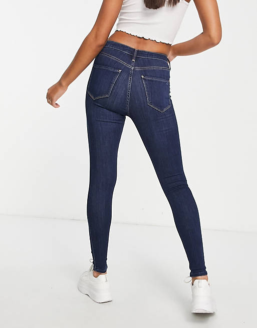 Hollister rip skinny jeans in indigo | ASOS