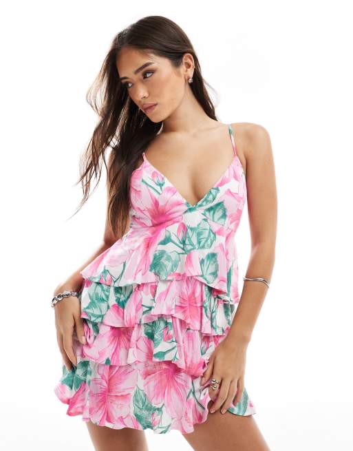 Hollister – Rosa, småblommig, panelsydd miniklänning i babydoll-design med v-ringning och smala axelband