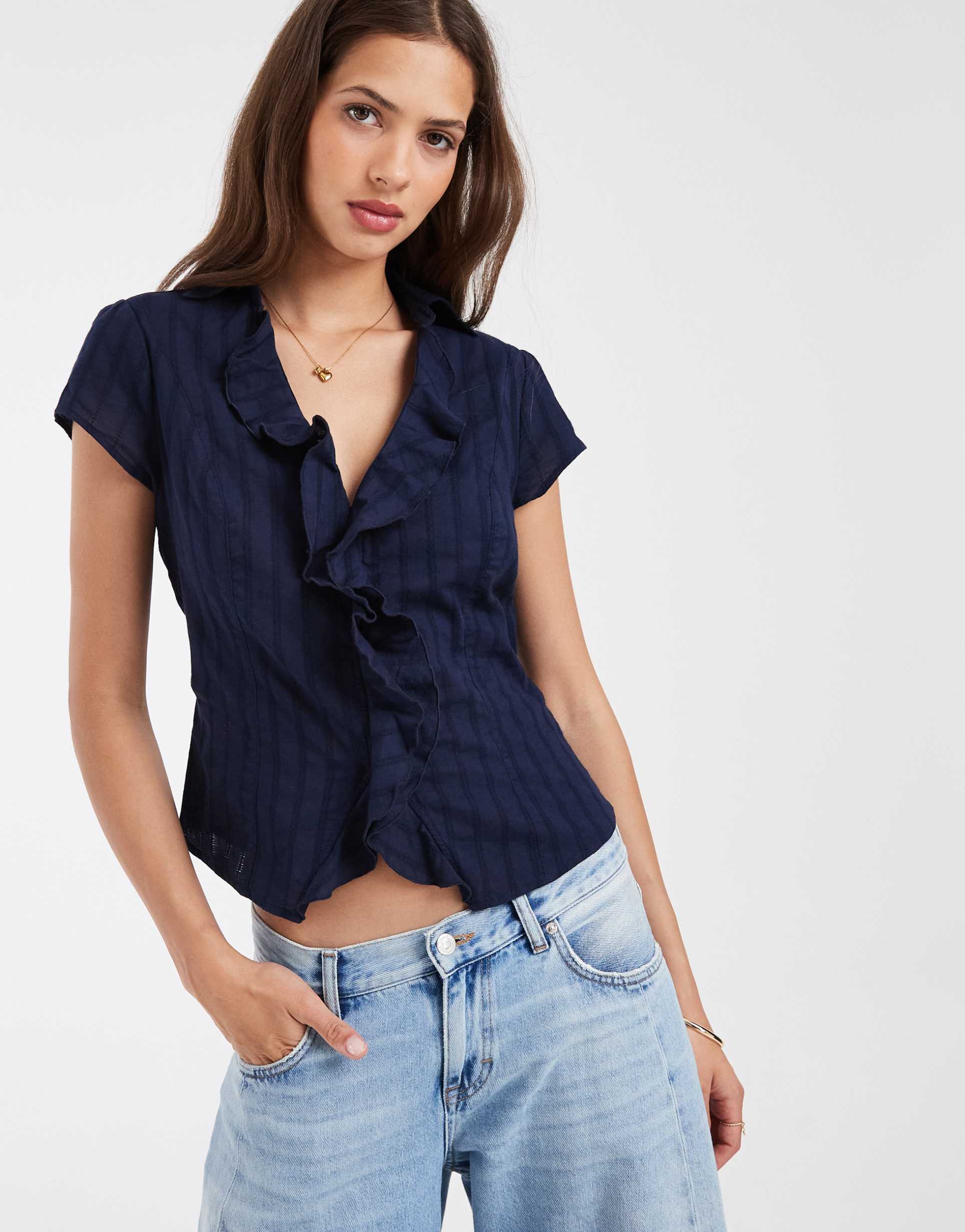hollister ruffle front short sleeve shirt in navy