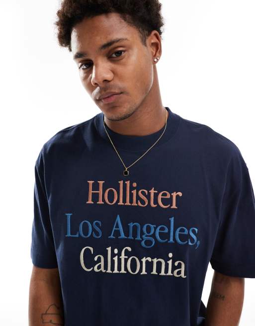 Hollister – Schweres, kastiges T-Shirt in Marineblau mit buntem Logo