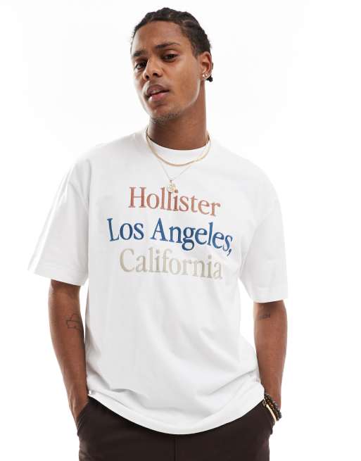 Hollister Schweres kastiges T Shirt in WeiB mit mehrfarbigem Logodruck ASOS