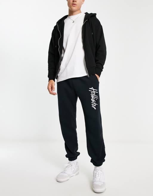 Hollister script logo sweat trackies in black