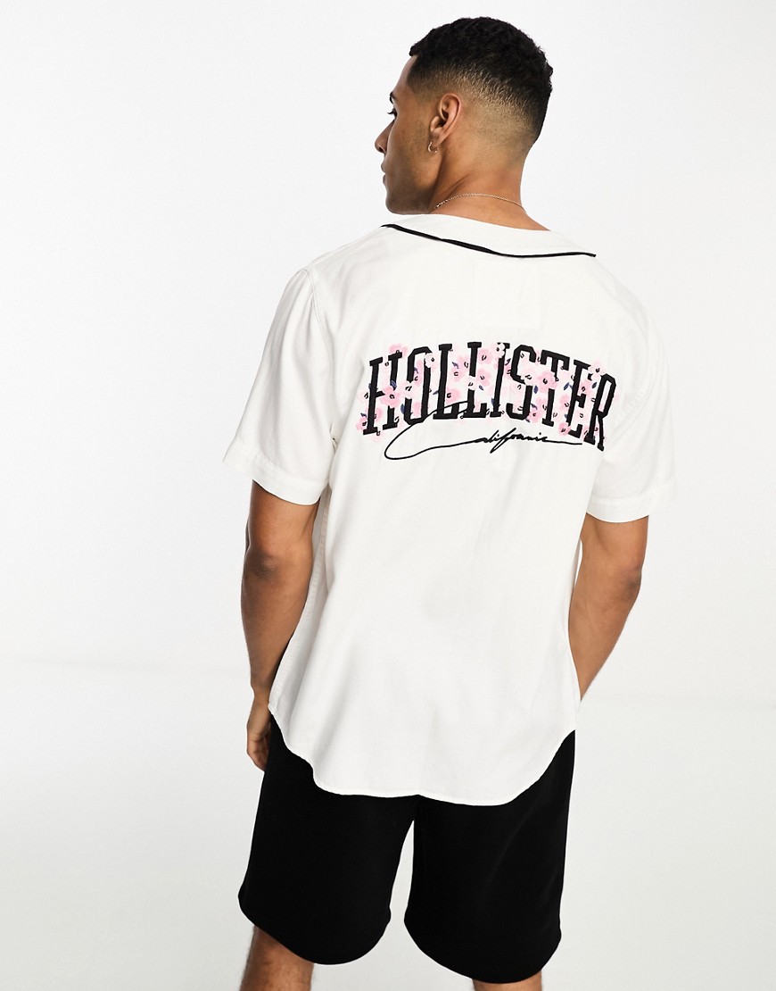 Hollister short sleeve cherry blossom logo back print baseball shirt in white