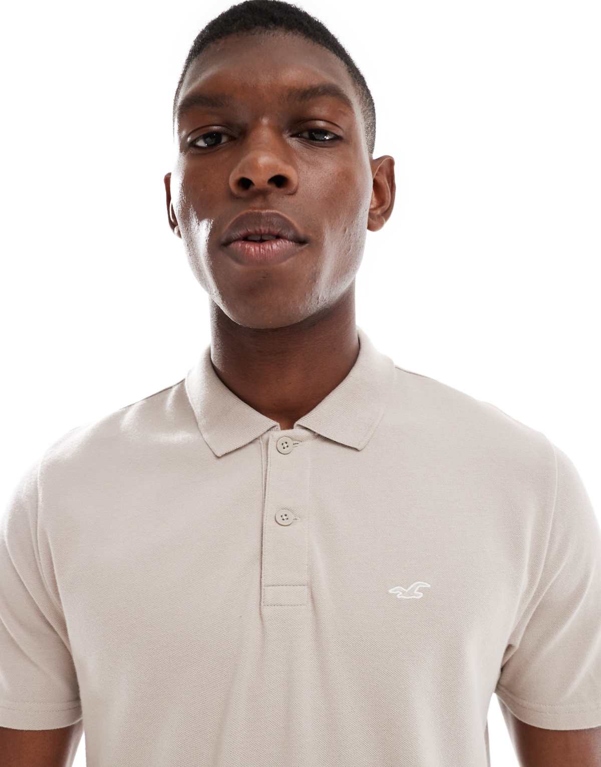 Hollister short sleeve chest logo polo neck t-shirt in cream