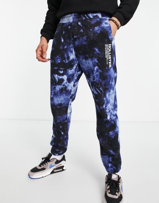 Hollister side logo acid wash cuffed sweatpants in navy