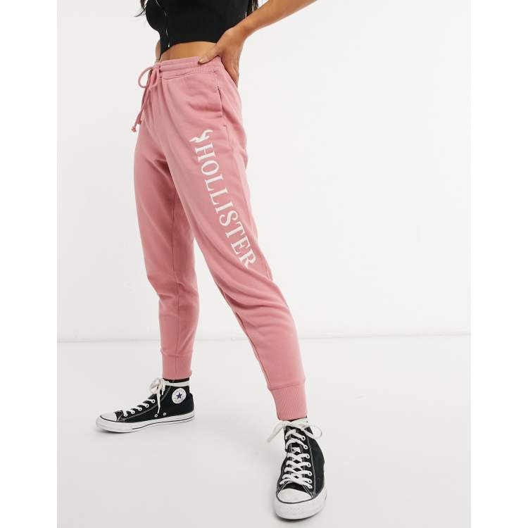 Hollister logo hot pink drawstring joggers .size XS, - Depop