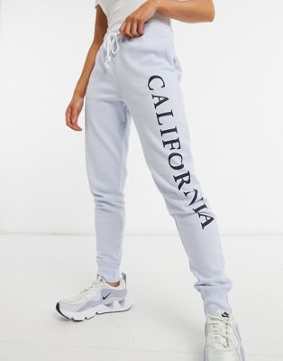 Hollister side logo trackies in blue | ASOS