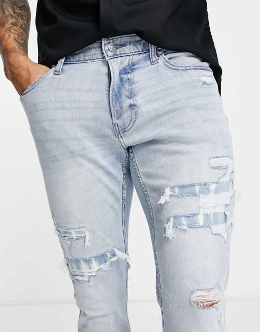 Hollister Slight Distressed Skinny Fit Jeans in Blue for Men