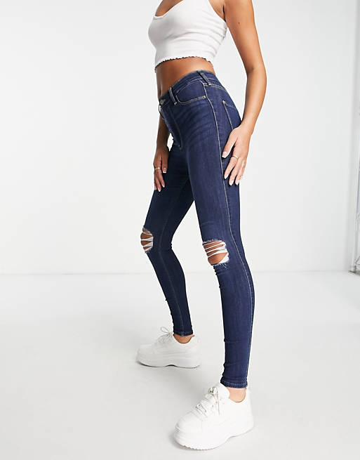 Hollister - Skinny jeans met scheuren in indigo