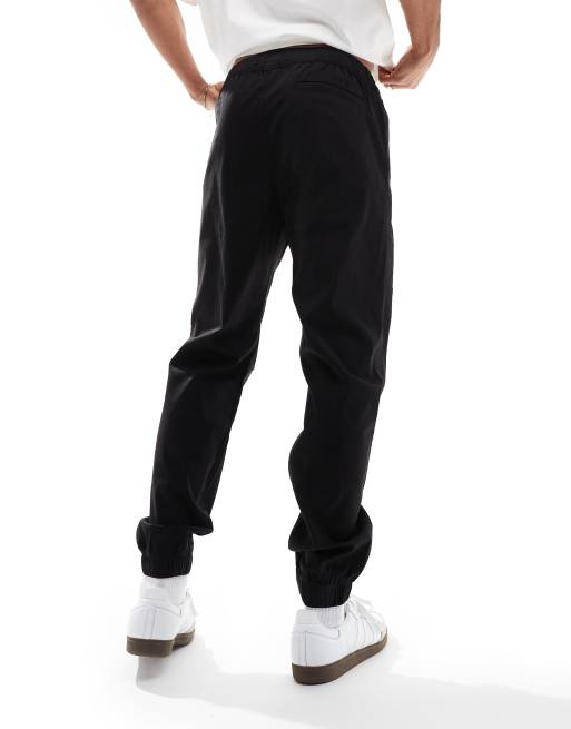 Hollister Skinny joggingbroek van katoen en nylon met boorden in zwart ASOS