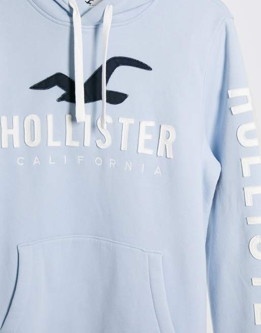 Hollister sleeve logo hoodie in light blue, ASOS