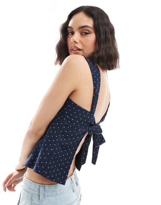 Hollister sleeveless tie back linen top in navy polka dot ASOS