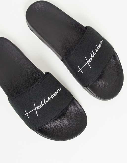 Hollister – Slider in Schwarz mit Schriftzug-Logo