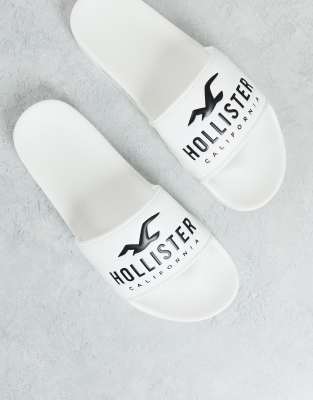 Hollister – Slider in Weiß mit Markenlogo, exklusiv bei ASOS