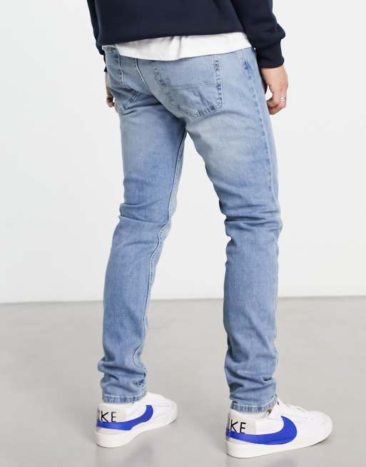 Hollister slight distressed skinny fit jeans in mid wash