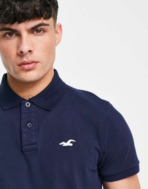 Hollister slim fit polo shirt in navy with logo