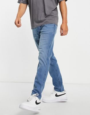 Hollister slim tapered fit jeans in clean bright medium wash