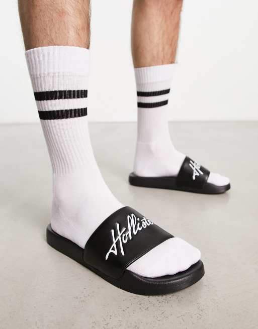 Hollister - Slippers met scriptlogo in zwart