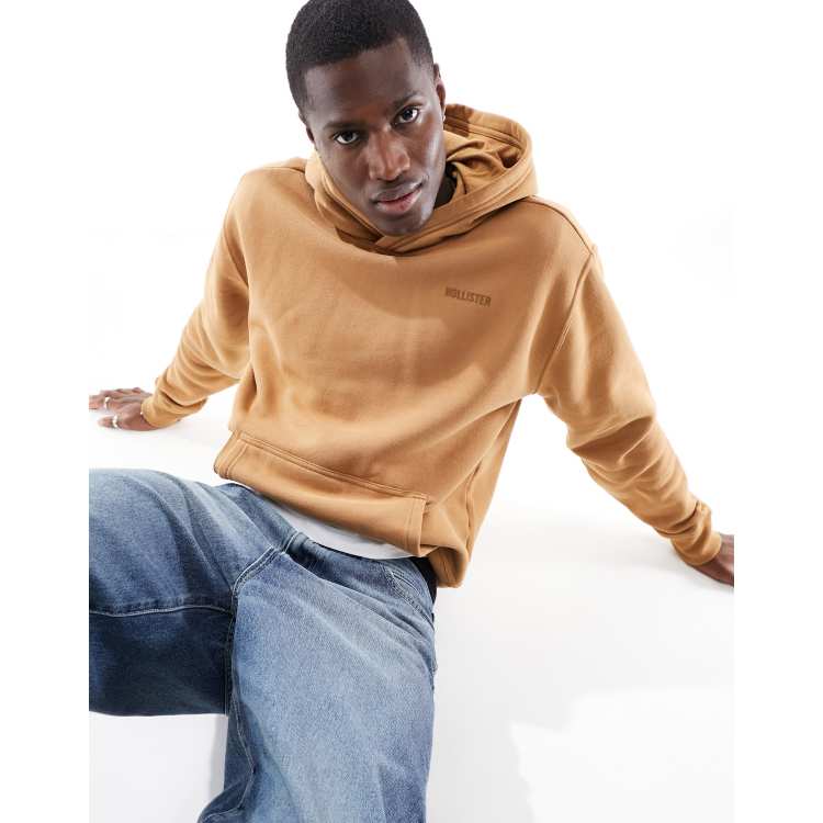 ClassicfuncenterShops Hollister small scale logo relaxed fit hoodie with zip pocket in light brown Ellesse Black Overlep Leopard Print T Shirt