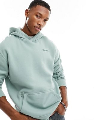 Hollister small scale logo relaxed fit hoodie with zip pocket in sage green