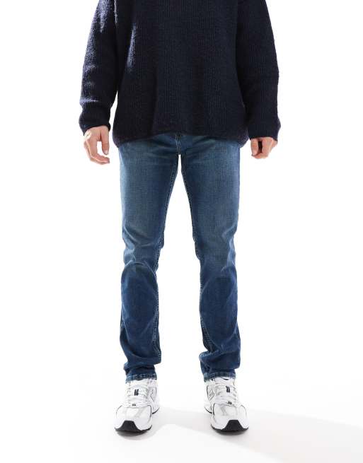 Hollister - Smalle jeans met rechte pasvorm in donkere wassing