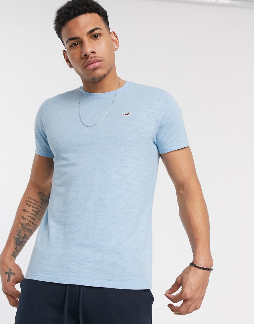 Hollister - Snow - T-shirt girocollo blu mélange con logo a gabbiano