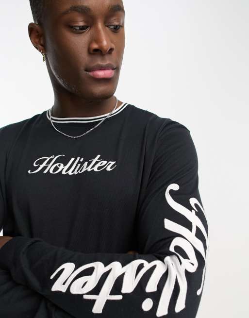 Hollister - Sort langærmet T-shirt med farvekant og centralt logoprint og print på armen