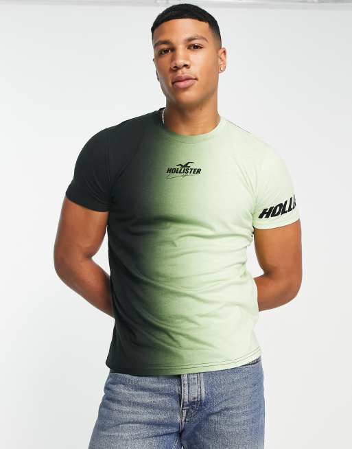 Hollister - Sport Central - T-shirt met logo in het midden en op de mouw in groen met kleurverloop