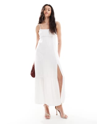 square neck babydoll maxi dress with a slit in white polka dot