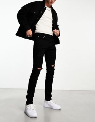 Hollister stacked skinny fit distressed jeans in black - ASOS Price Checker