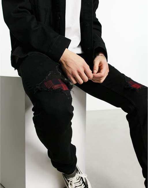 stacked black joggers