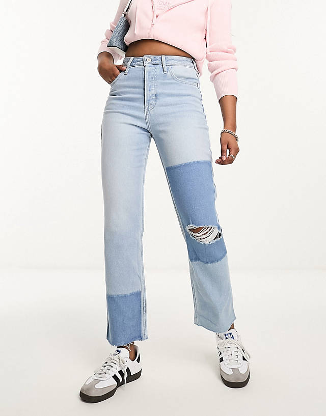 Hollister - straight leg jeans with patchwork effect in light blue