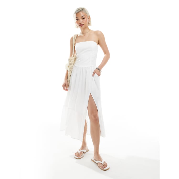 Hollister strapless dropped waist textured midi dress with a slit in White