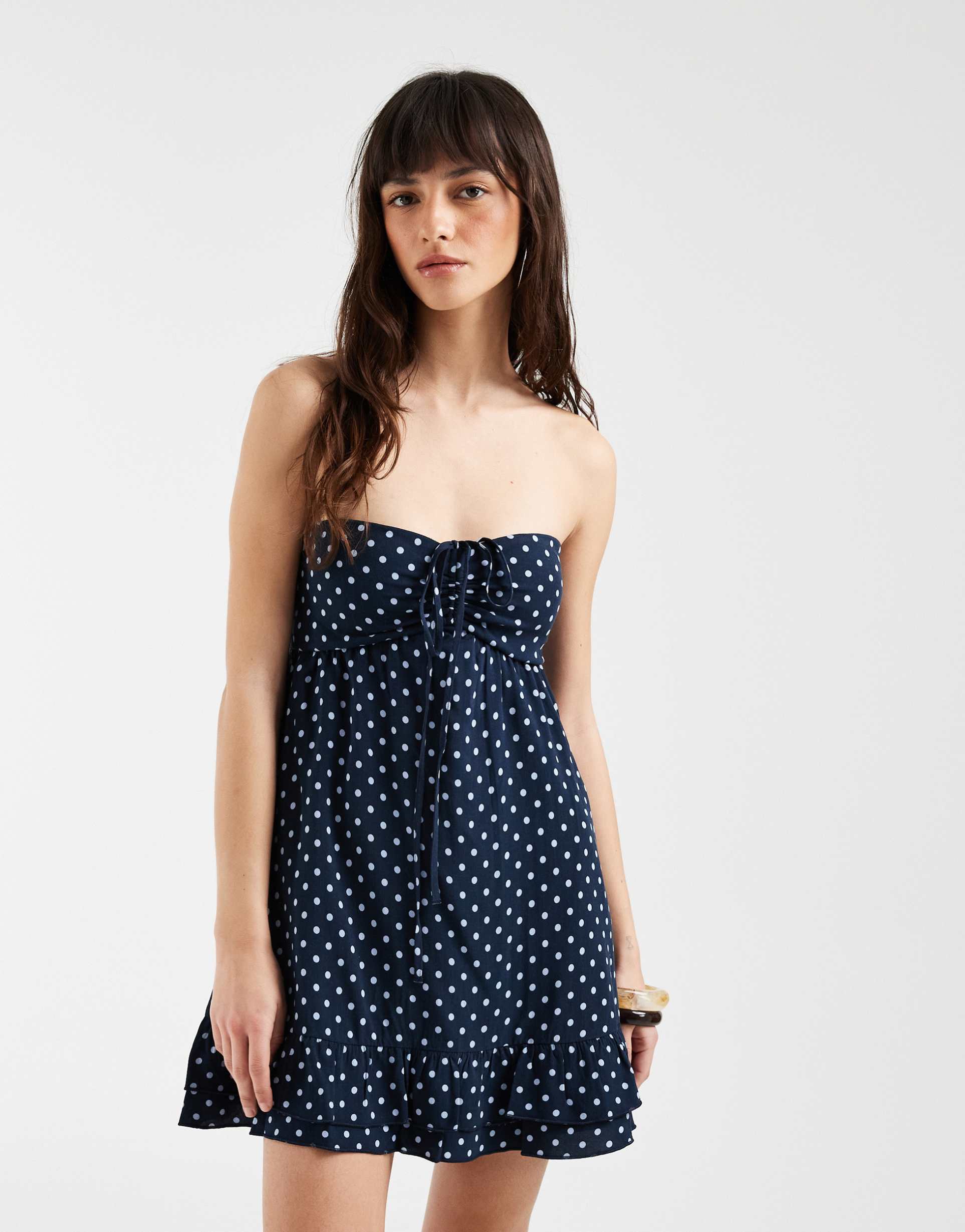 hollister strapless tie front ruffle trim babydoll mini dress in navy polka dots