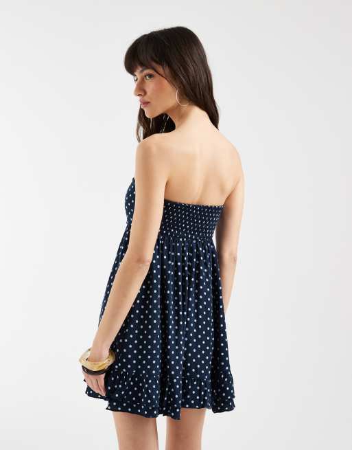 blue polka dot strapless dress Lorcan Strapless Ruffle Dotted Midi Dress Blue