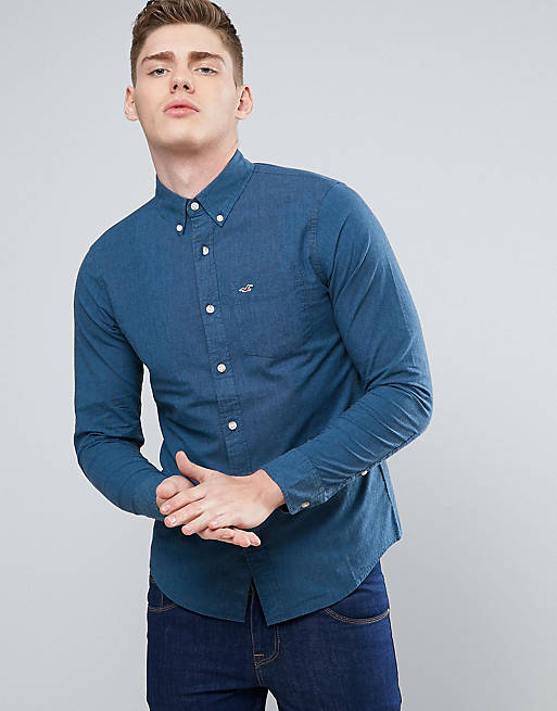 https://images.asos-media.com/products/hollister-stretch-poplin-logo-shirt-slim-fit-in-navy/7452733-1-navy?$n_640w$&wid=513&fit=constrain
