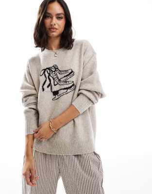 Hollister - Strickpullover in Hellbraun mit winterlichem Schlittschuh-Motiv