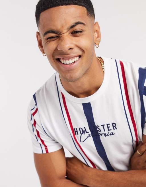 Hollister striped small scale logo t shirt in white ASOS
