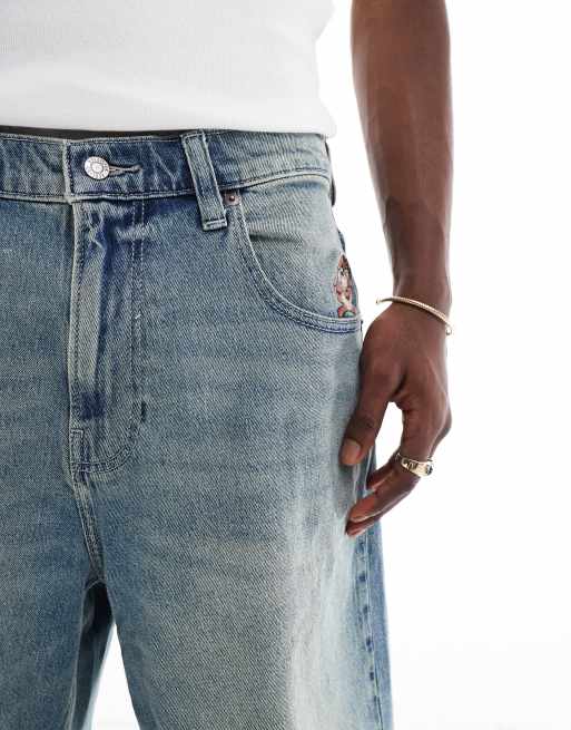 Hollister super baggy denim embroidered short in medium wash, 3 of 5